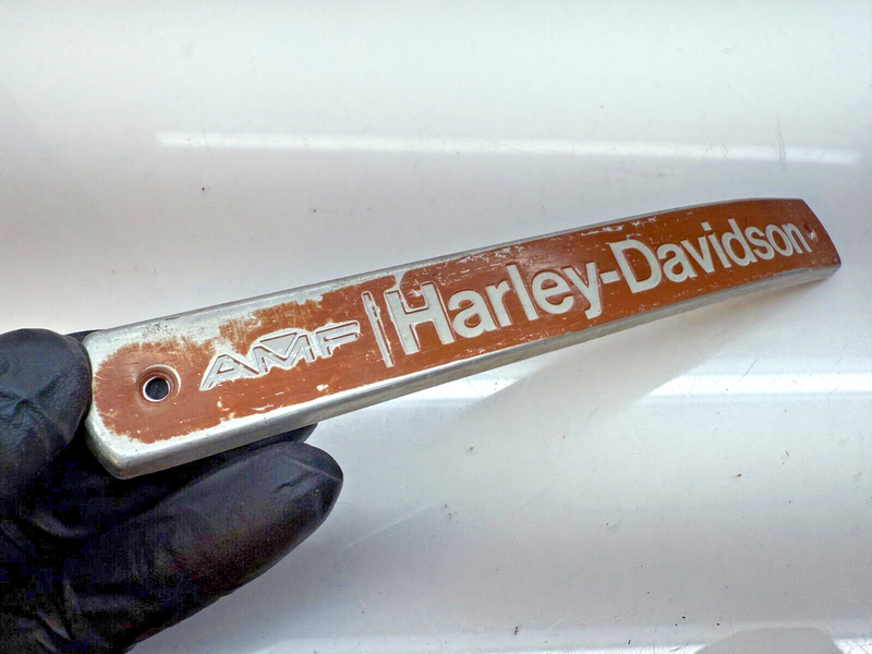 OEM AMF Harley Davidson Shovelhead Gas Tank Badge Emblem 61793-77 B32-108