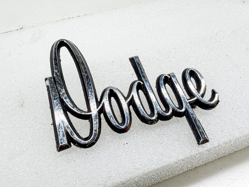OEM 1968 1969 1970 DODGE DART HOOD SCRIPT EMBLEM MOPAR 2786482 E10-52