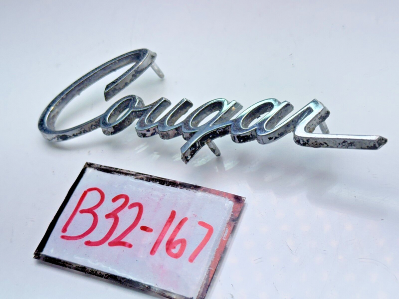 OEM 1974 Mercury Cougar Emblem Fender Molding Nameplate Body Trim Panel B32-167