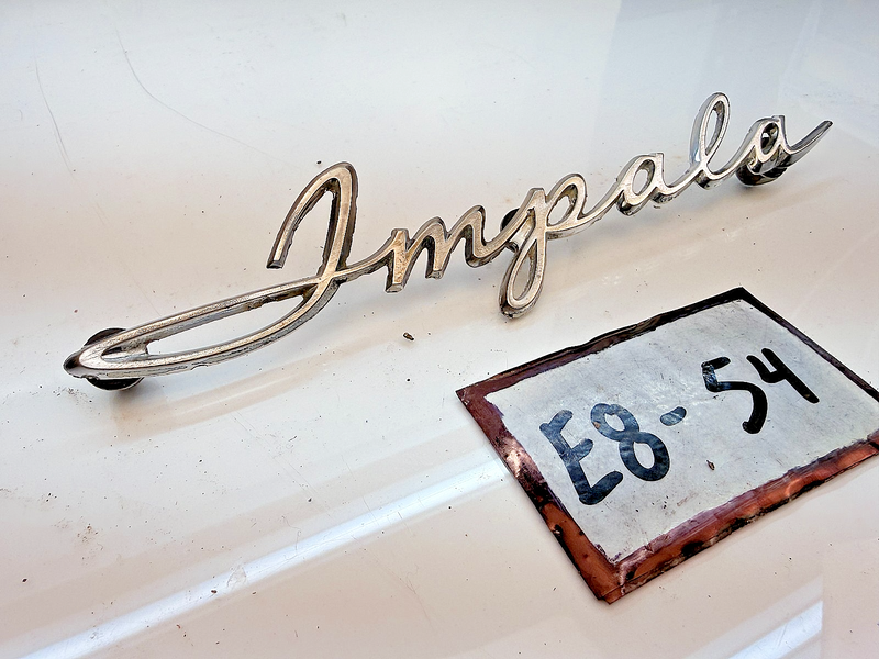 OEM 1961 1962 CHEVROLET IMPALA QUARTER PANEL NAMEPLATE SCRIPT EMBLEM E8-54
