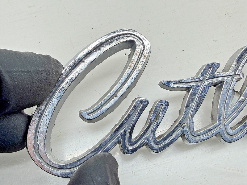 OEM 1968 Oldsmobile Cutlass Trunk Script Emblem Name Plate 7791576 E9-72