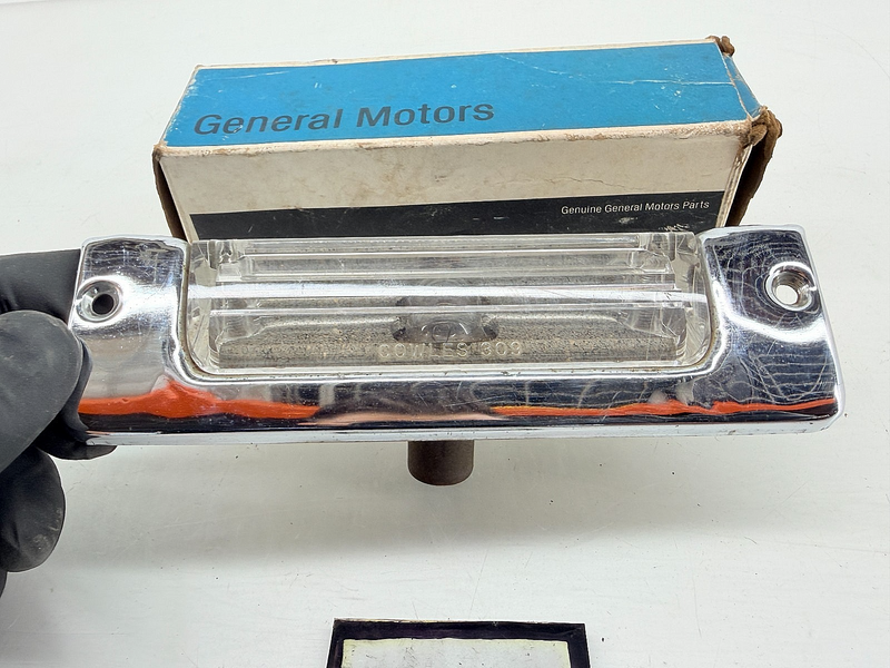 NOS 1957 Chevrolet BelAir 210 Rear License Plate Light Lamp 898309 C73-20