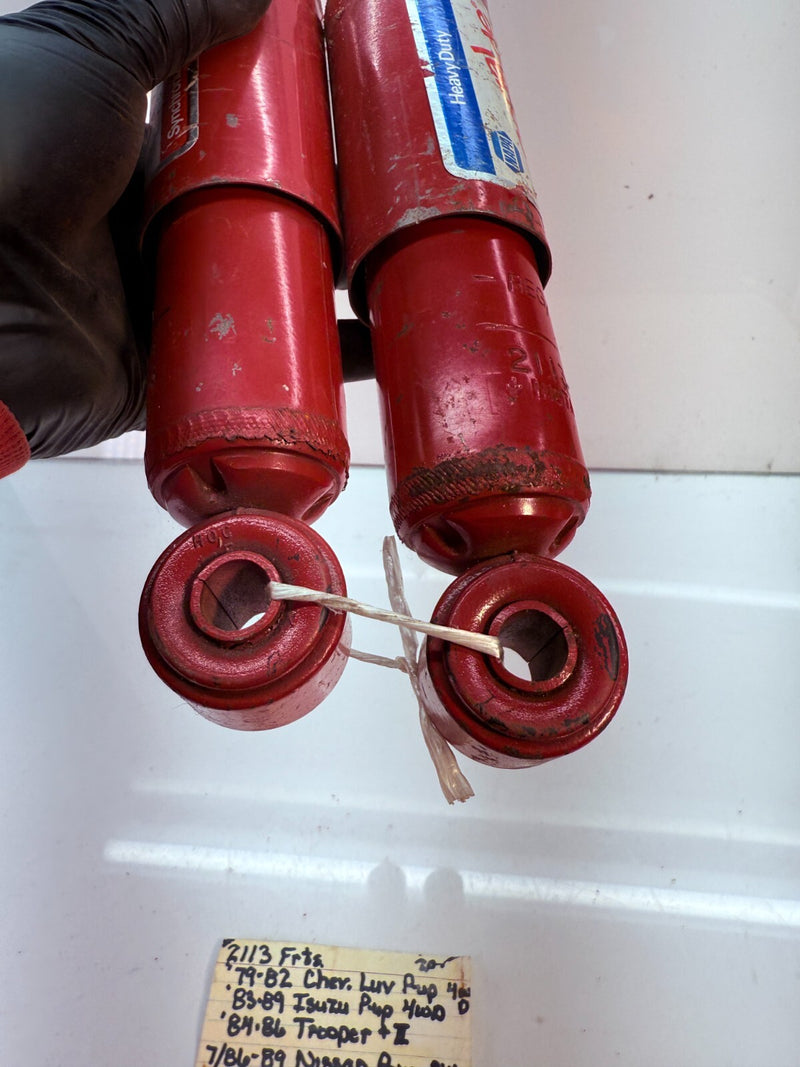 NOS PAIR SHOCK ABSORBER 1979 - 1989 ISUZU TROOPER MK1 NISSAN PICKUP B56-12