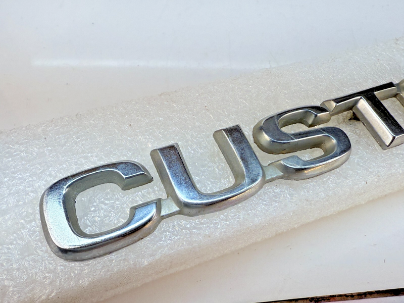 OEM 1980 - 1986 Ford F-150 Custom Metal Fender Emblem E0TB-16B114-CC B32-205