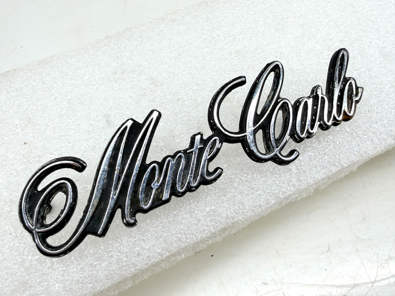 OEM 1973 - 1977 Chevrolet Monte Carlo Header Panel Emblem 325272 E9-99