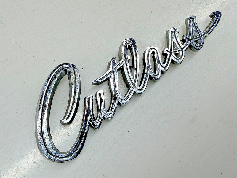 OEM 1968 Oldsmobile Cutlass Trunk Script Emblem Name Plate 7791576 E9-72