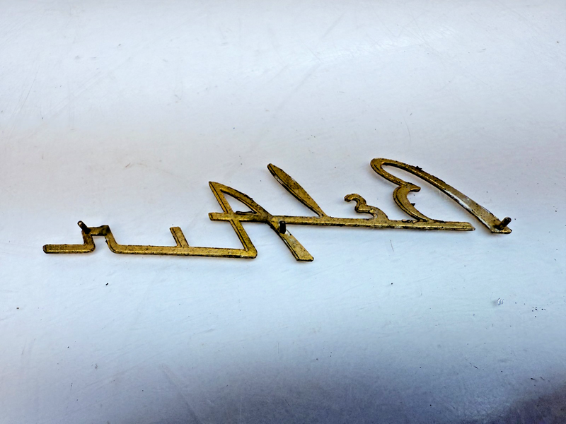 1955 1956 Chevrolet Belair Dash Speaker Grille Emblem Script Gold E7-51