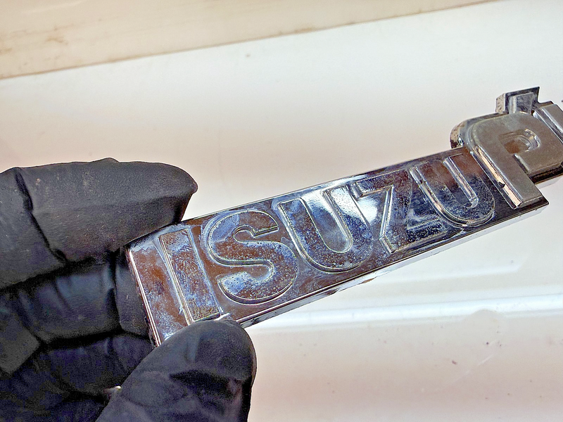 OEM 1983 - 1987 Isuzu Pup Pick Up Truck Fender Emblem E8-35