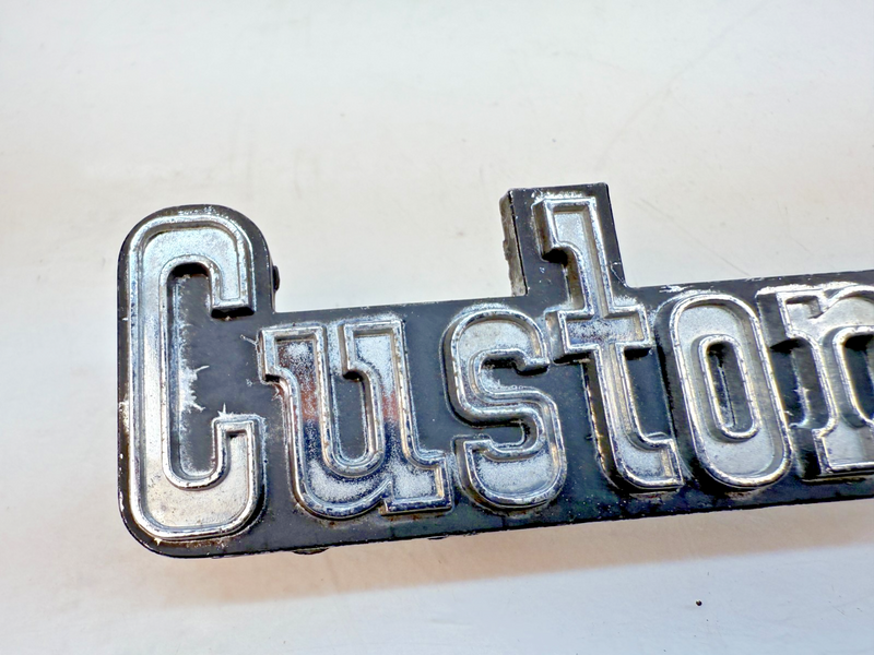 OEM Chevy 1975 - 1979 C10 K10 Custom Deluxe FENDER EMBLEM 6273126 E7-56