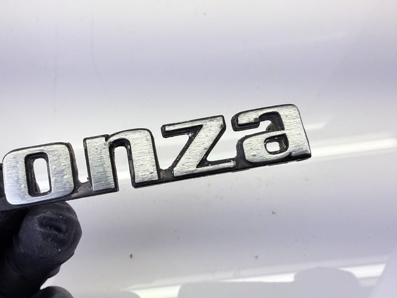 Vintage OEM 1975 - 1980 Chevrolet Monza Fender Emblem Badge 1693836 E8-109