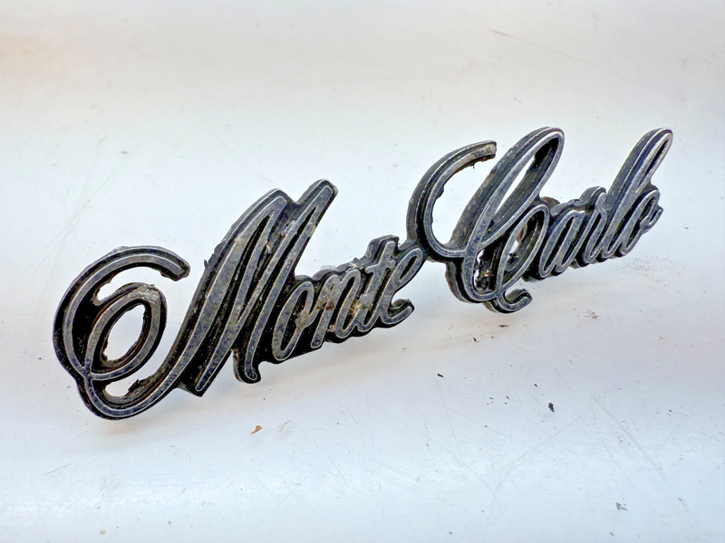 OEM 1973 - 1977 Chevrolet Monte Carlo Header Panel Emblem 325272 E6-116