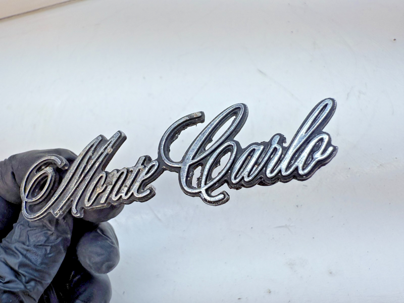 OEM 1973 - 1977 Chevrolet Monte Carlo Header Panel Emblem 325272 E6-116