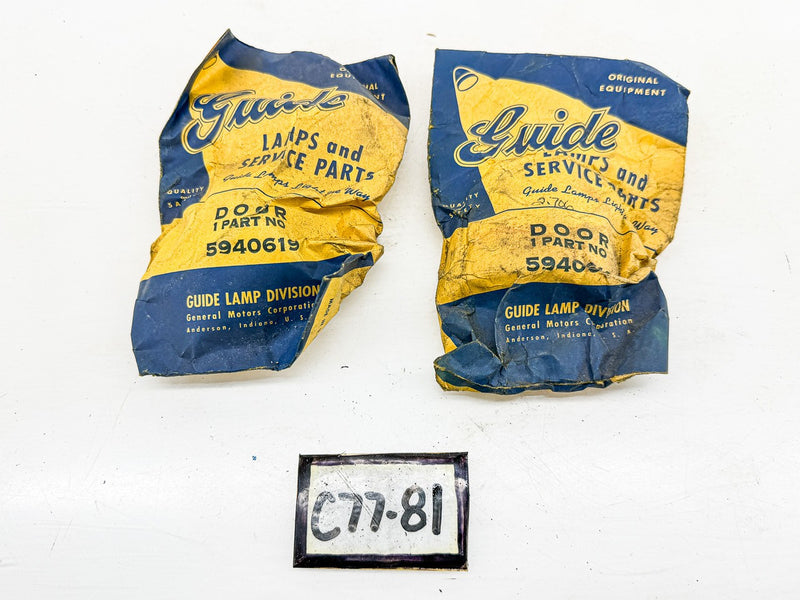(1) NOS 1959 - 1964 GM GUIDE DOOR COURTESY LAMP GM 5940619 C77-81
