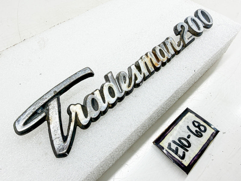 OEM 1971 - 1979 DODGE VAN TRADESMAN 200 FENDER EMBLEM 2956457 E10-68