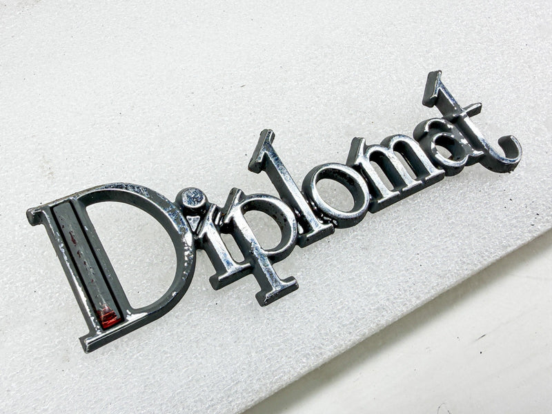 OEM 1978 - 1983 DODGE DIPLOMAT FENDER EMBLEM MOPAR 4017344 E10-91