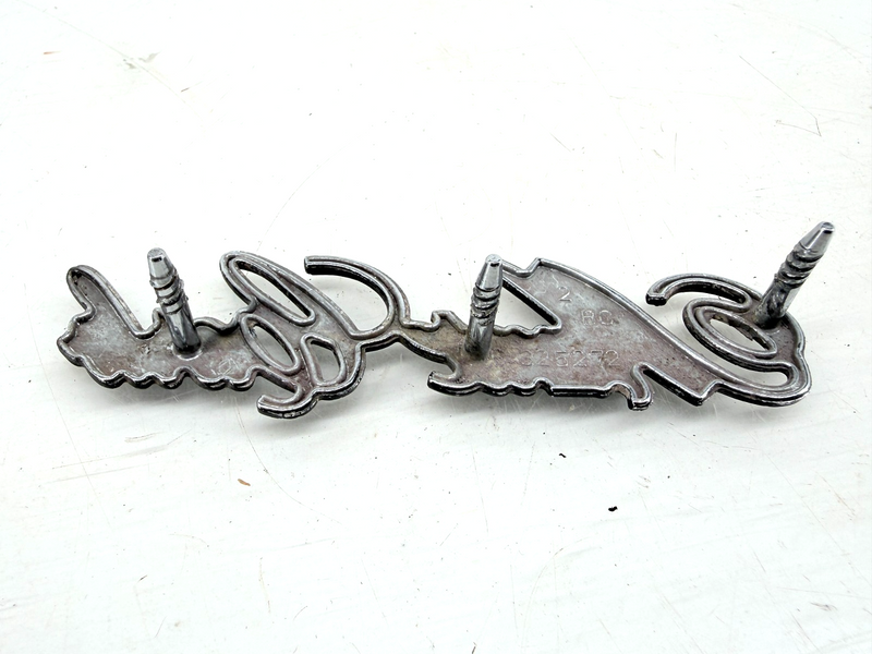OEM 1973 - 1977 Chevrolet Monte Carlo Header Panel Emblem 325272 E9-99