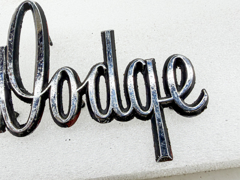 OEM 1968 1969 1970 DODGE DART HOOD SCRIPT EMBLEM MOPAR 2786482 E10-52