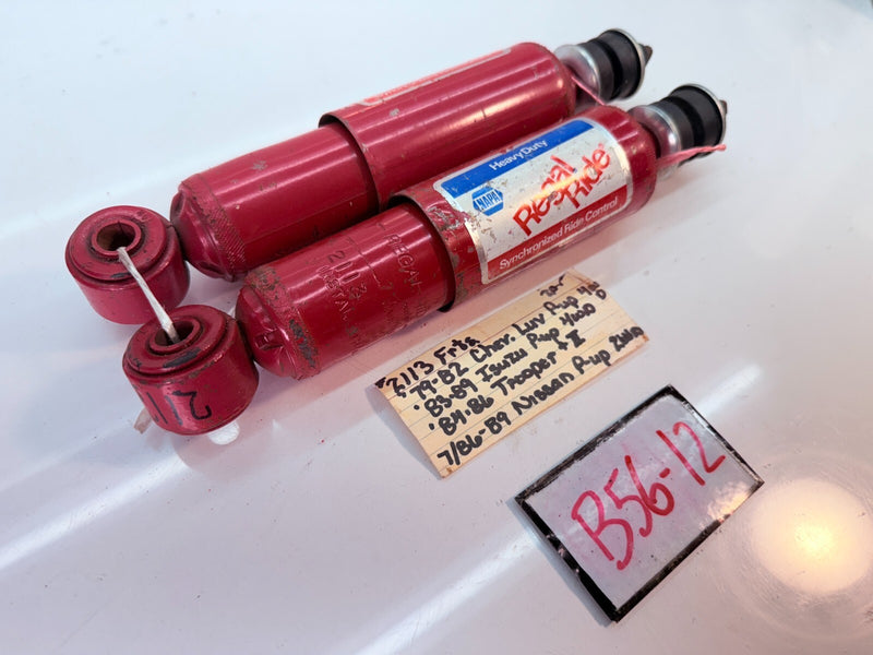 NOS PAIR SHOCK ABSORBER 1979 - 1989 ISUZU TROOPER MK1 NISSAN PICKUP B56-12