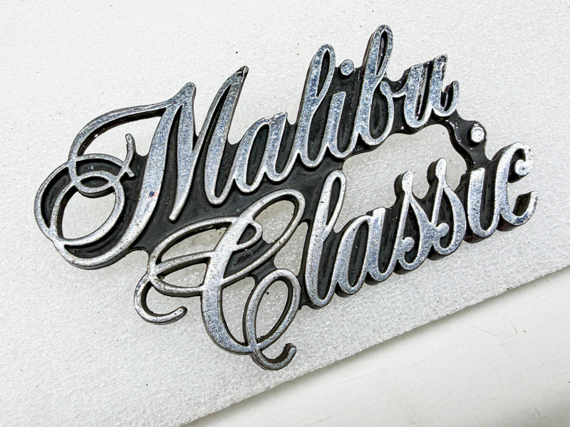 OEM 1974 - 1983 CHEVELLE MALIBU CLASSIC SCRIPT EMBLEM 345383 E10-54
