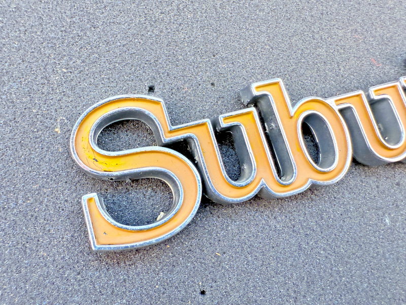 OEM 1973 - 1988 Chevrolet Suburban Tailgate Emblem Rear Metal 14016626 E7-94