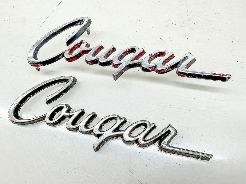 OEM 1969 1970 MERCURY COUGAR SCRIPT EMBLEM PAIR E10-41