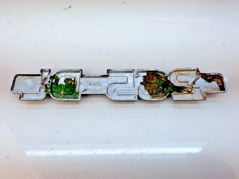 OEM 1979 Volvo 240 245 DL Trunk Badge Tailgate Emblem E6-40