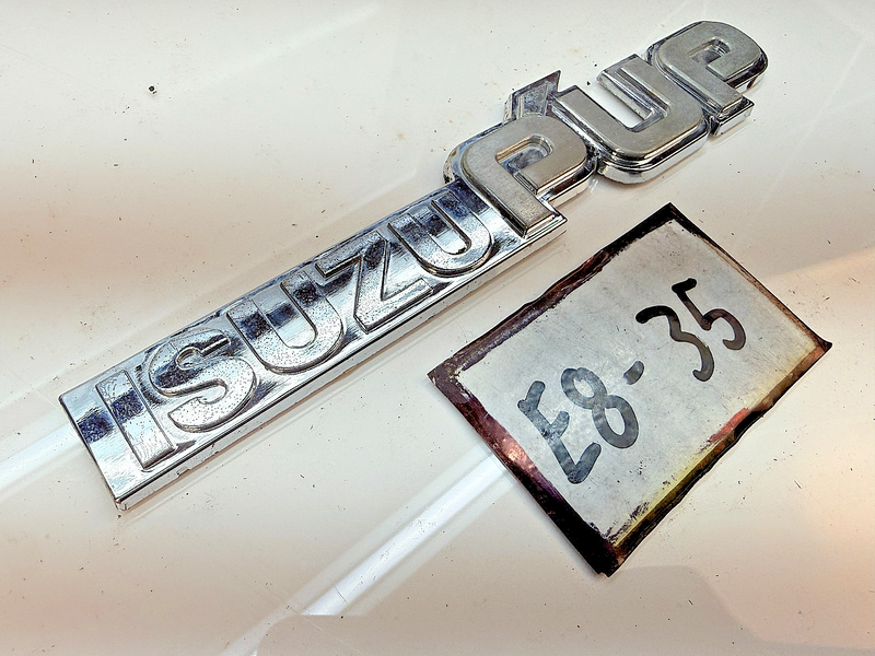 OEM 1983 - 1987 Isuzu Pup Pick Up Truck Fender Emblem E8-35