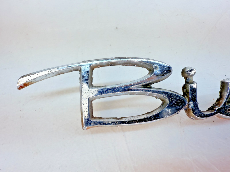 OEM 1964 CHEVROLET BISCAYNE CHROME QUARTER PANEL SCRIPT EMBLEM 4886814 E7-4