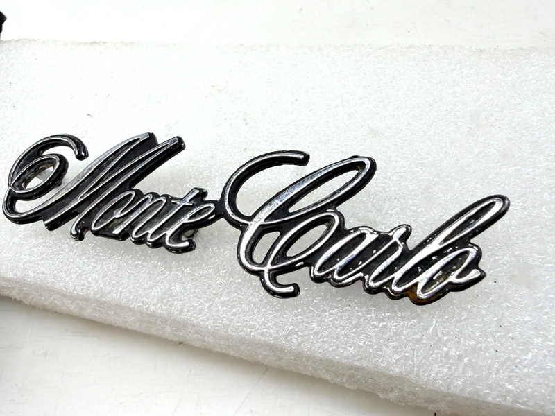 OEM 1973 - 1977 Chevrolet Monte Carlo Header Panel Emblem 325272 E9-99