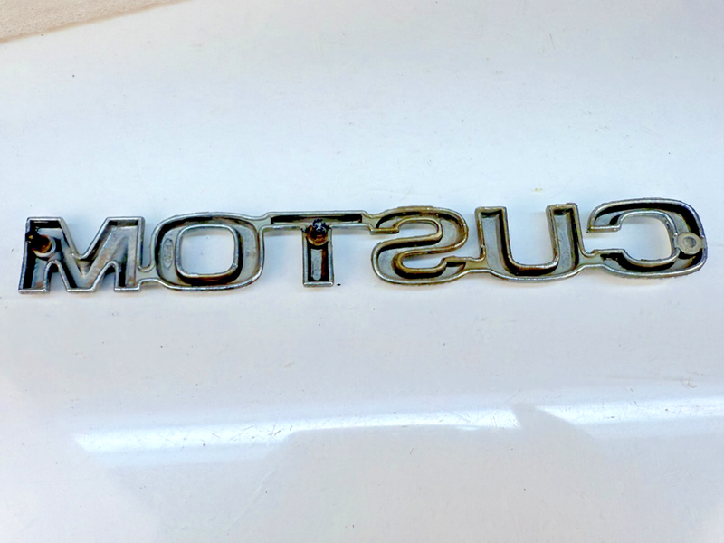 OEM 1980 - 1986 Ford F-150 Custom Metal Fender Emblem E0TB-16B114-CC B32-205