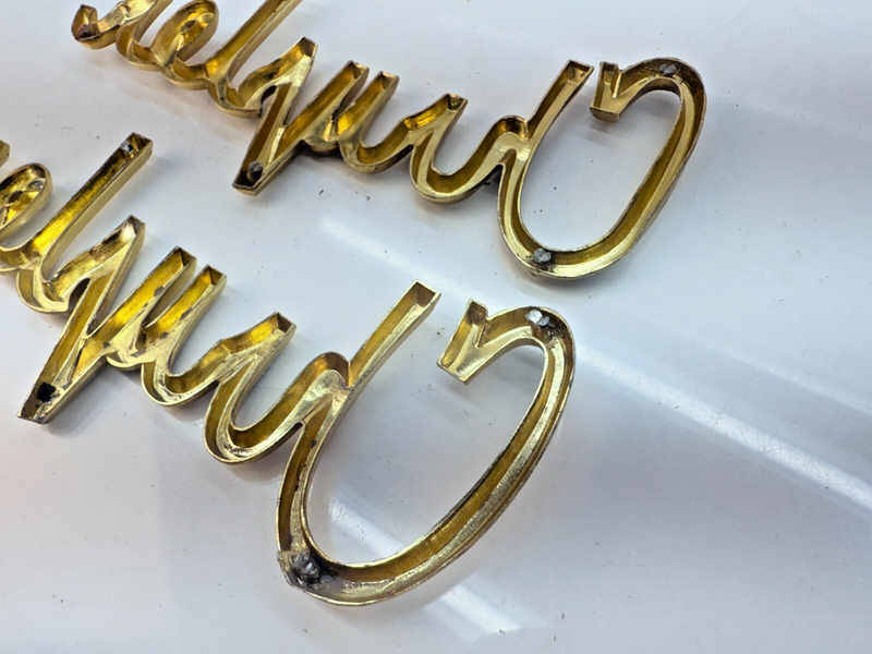 OEM 1962 CHRYSLER NEWPORT WINSOR GOLD PAIR of FRONT FENDER EMBLEM BADGE B32-321