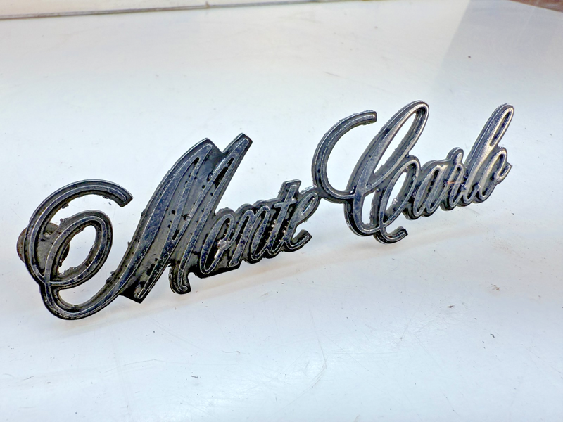 OEM 1973 19174 1975 1976 1977 CHEVY MONTE CARLO FENDER EMBLEM GM 328945 E6-119