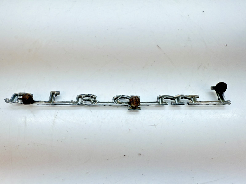 OEM 1967 Chevy Impala Rear Quarter Panel Emblem Nameplate Script E6-102